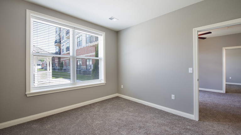 Bedroom with large window